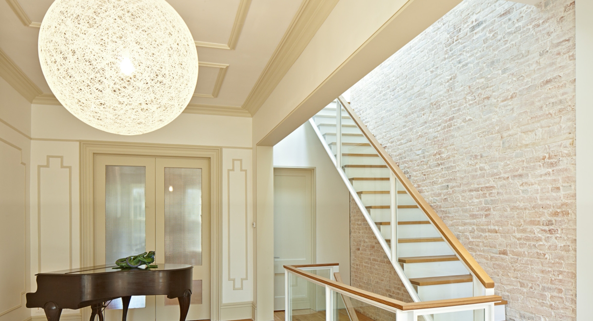 The formerly narrow Parlor is made spacious with the removal of the stair partit