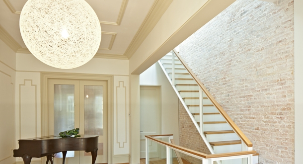 The formerly narrow Parlor is made spacious with the removal of the stair partit