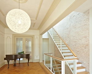 The formerly narrow Parlor is made spacious with the removal of the stair partit