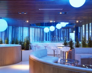 Lighting, graphics and a rich materials palette combine in an elegant, playful V